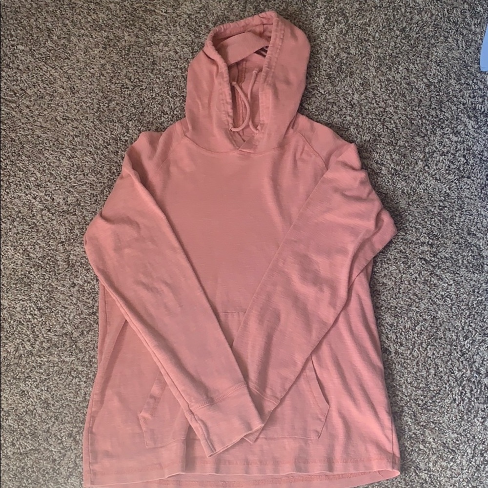 Salmon pink sweatshirt.